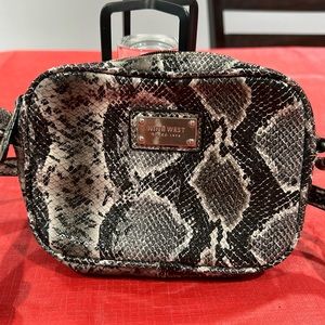 Used nine wear snake print crossbody